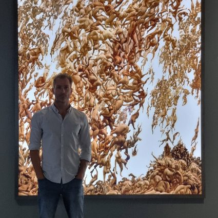 Scott Eaton portrait with artwork