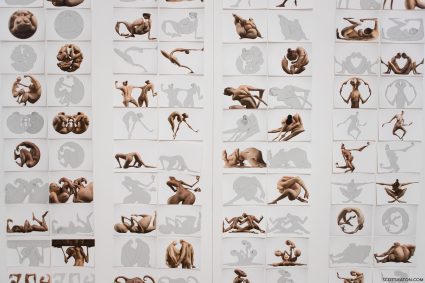 Wall of AI augmented drawings by Scott Eaton